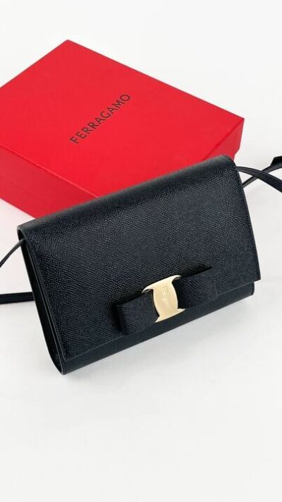 Salvatore Ferragamo, a black saffiano leather crossbody bag